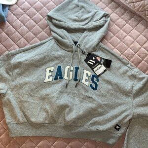 NEVER WORN. NFL team apparel. Eagles hoodie. Originally $80. Still has tags